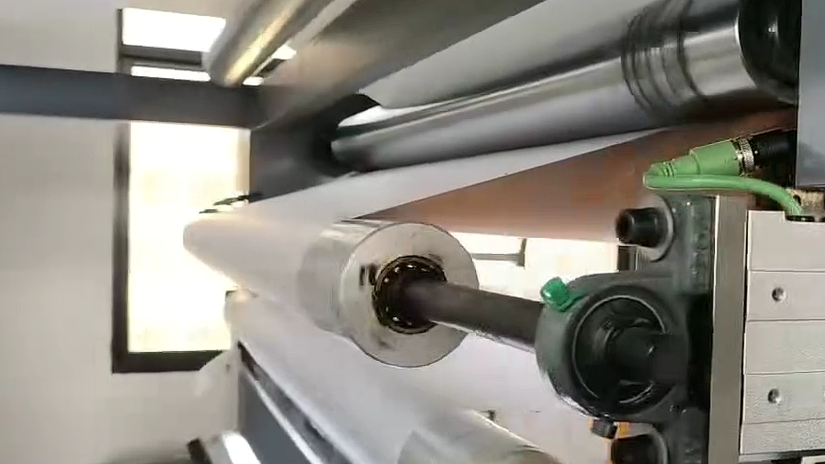 Automatic tension control in a multi-roller web section
